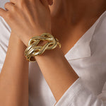 Gold-Toned Braided Knot Cuff Bracelet — Adjustable