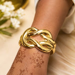 Gold-Toned Braided Knot Cuff Bracelet — Adjustable
