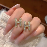 Crystal Pavé 'H' Letter Stud Earrings – Gold-Toned