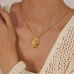 Gold-Toned Feather Swirl Statement Necklace for Women