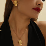 Gold-Toned Feather Swirl Statement Necklace for Women