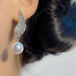 Silver-Toned Angel Wing Crystal & Pearl Drop Earrings
