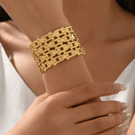 Gold-Toned Wide Woven Lattice Cuff Bracelet