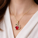 Swan crystal statement necklace worn on model