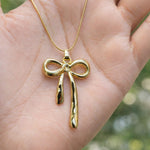 Molten Bow Pendant Necklace