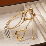 Gold-Toned Sculptural Double Heart Armlet