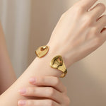 Sculptural Double Fin Cuff Bracelet – Gold-Toned Mirror Polish Open Bangle