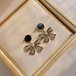Crystal Bow Drop Earrings with Pearl Centre