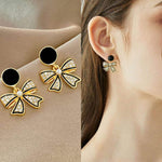 Crystal Bow Drop Earrings with Pearl Centre