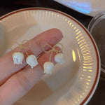 Ivory Tulip Bell Drop Earrings with Twisted Gold-Toned Bow