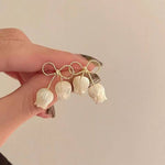 Ivory Tulip Bell Drop Earrings with Twisted Gold-Toned Bow
