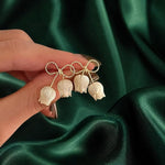 Ivory Tulip Bell Drop Earrings with Twisted Gold-Toned Bow