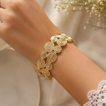 Gold-Toned Spiral Disc Cuff Bracelet